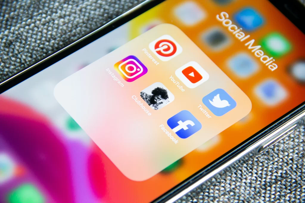 Phone screen displaying social media icons. 