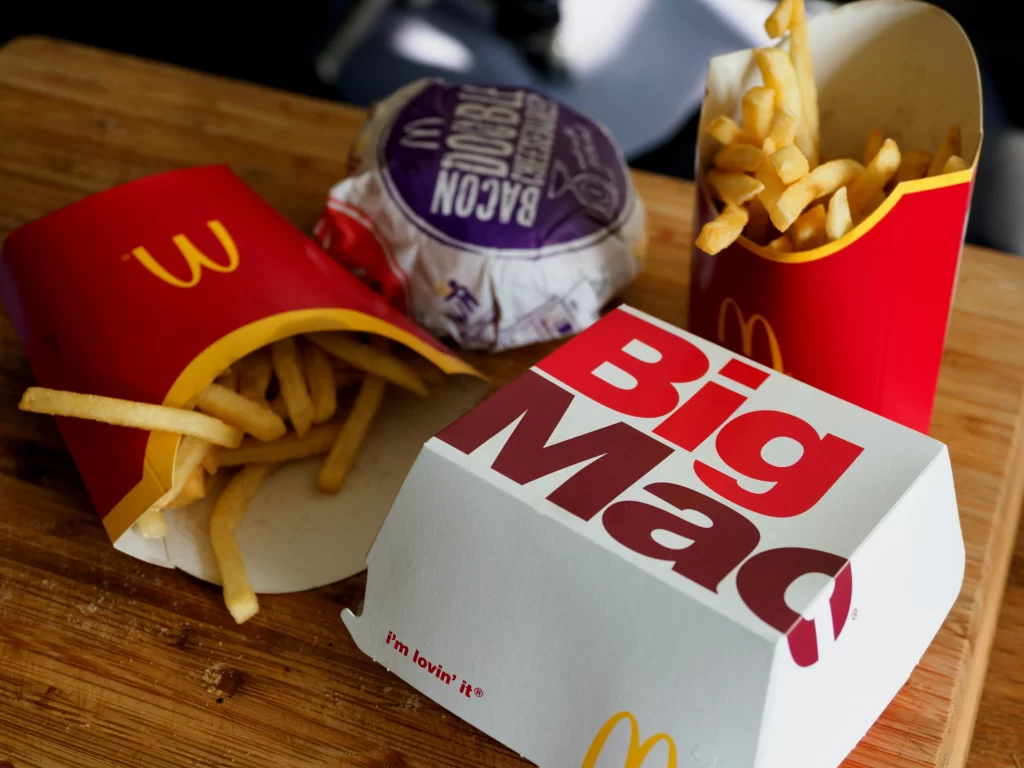 : A McDonald's Big Mac and fries, showcasing the iconic McDonald's branding. 