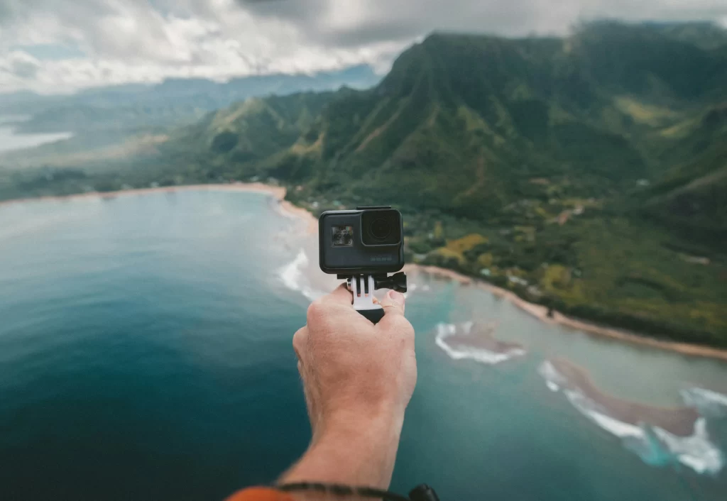 Person with a GoPro standing over a beautiful ocean view. 