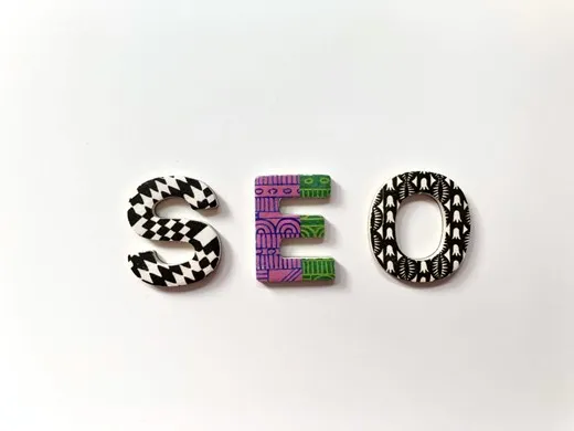 the letters SEO on a whiteboard background.